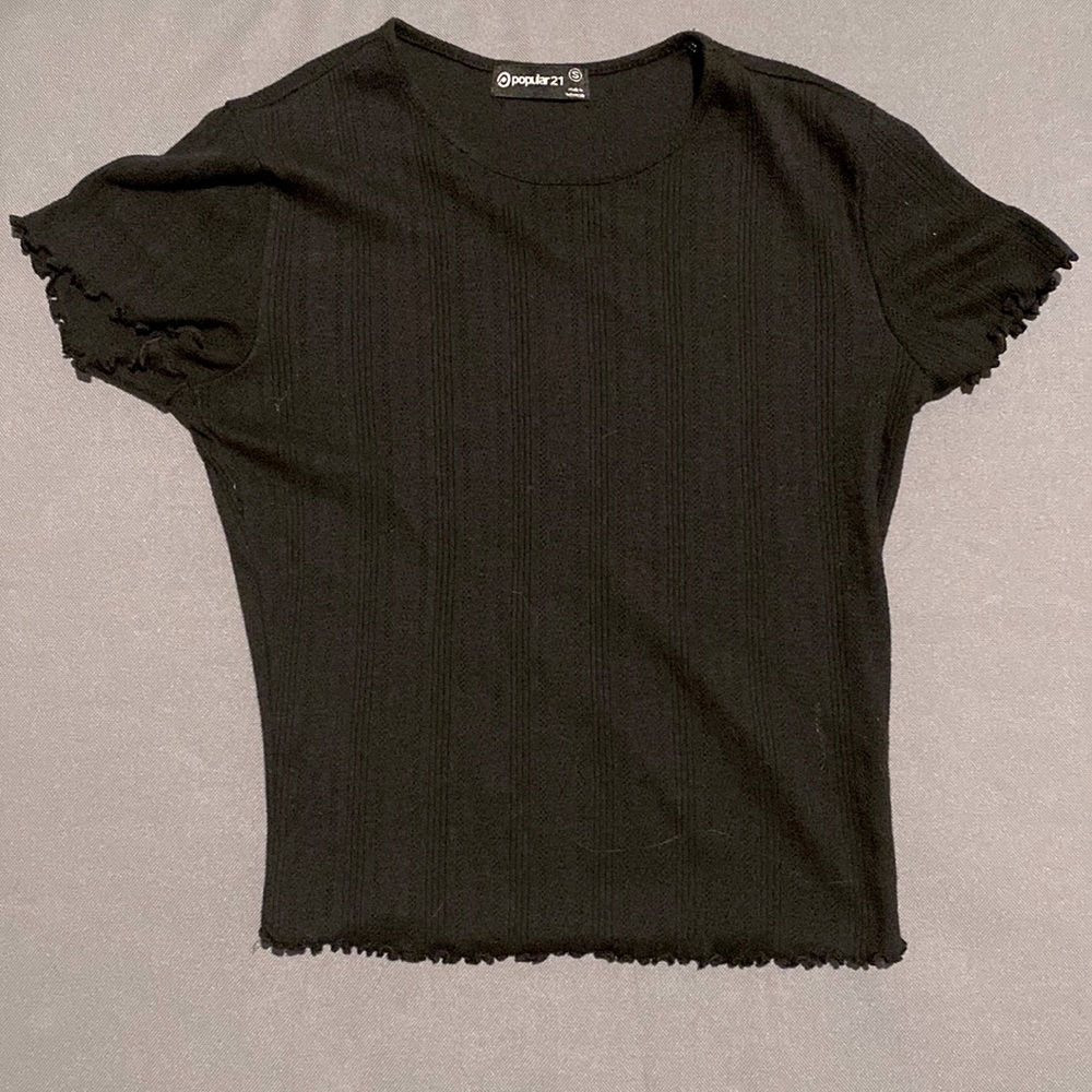 Slightly cropped black top size small